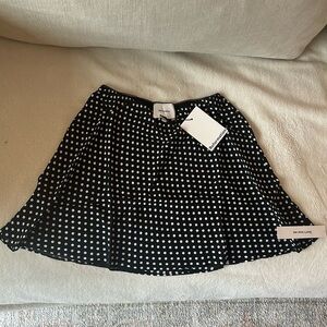 Never before worn Brandy Skirt (in black and white polka dot) by Reformation